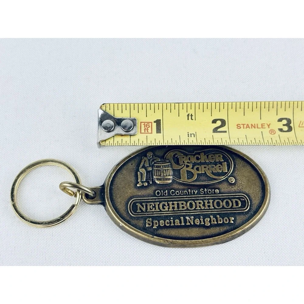 Cracker Barrel Neighborhood Special Neighbor Metal Keychain Brass Country